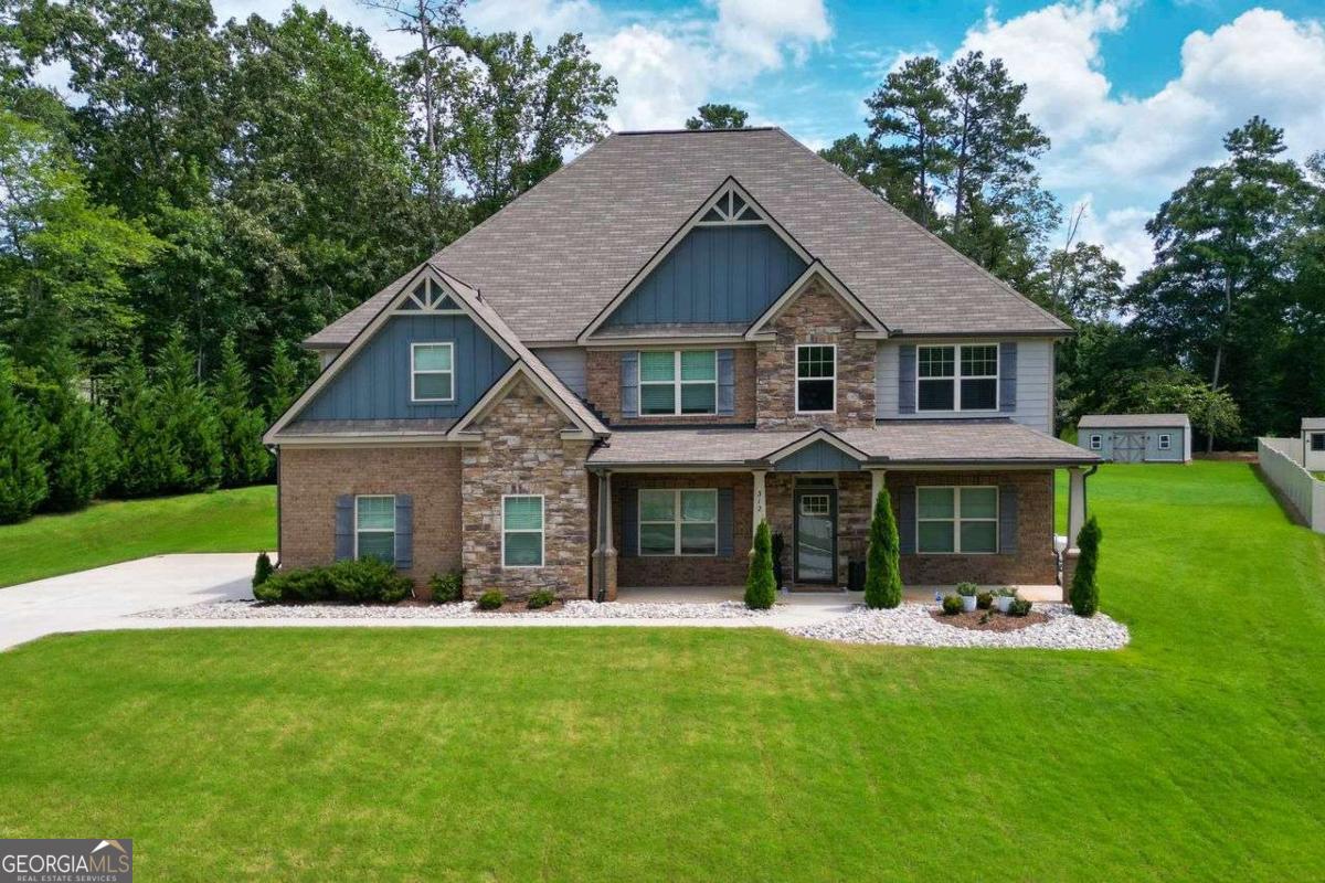 Welcome to this stunning 5-bedroom, 4.5-bath home ideally located just 30 minutes from Atlanta's Hartsfield-Jackson International Airport and less than an hour from the heart of the vibrant city of Atlanta. Nestled in a desirable neighborhood close to top-rated schools, parks, and shopping, this property combines comfort, convenience, and exceptional value. From the moment you step inside, you'll be captivated by the spacious open-concept design, elegant finishes, and natural light that flows throughout. Updated features throughout, include customized and modernized closets that maximize storage and organization. The gourmet kitchen is a chef's dream, featuring sleek quartz countertops and top-of-the-line appliances. The inviting enclosed porch offers a perfect year-round space for relaxing or entertaining, while the spacious backyard provides endless opportunities for gatherings, gardening, or play. A $15,000 whole-home generator is included-an incredible value that ensures uninterrupted comfort and peace of mind year-round. Outside, you'll also find a versatile storage shed for all your tools and hobbies. Whether you're commuting to Atlanta, enjoying nearby parks, or taking advantage of the area's excellent schools and shopping, this home offers a lifestyle that truly has it all. Don't miss your chance-schedule your showing today!