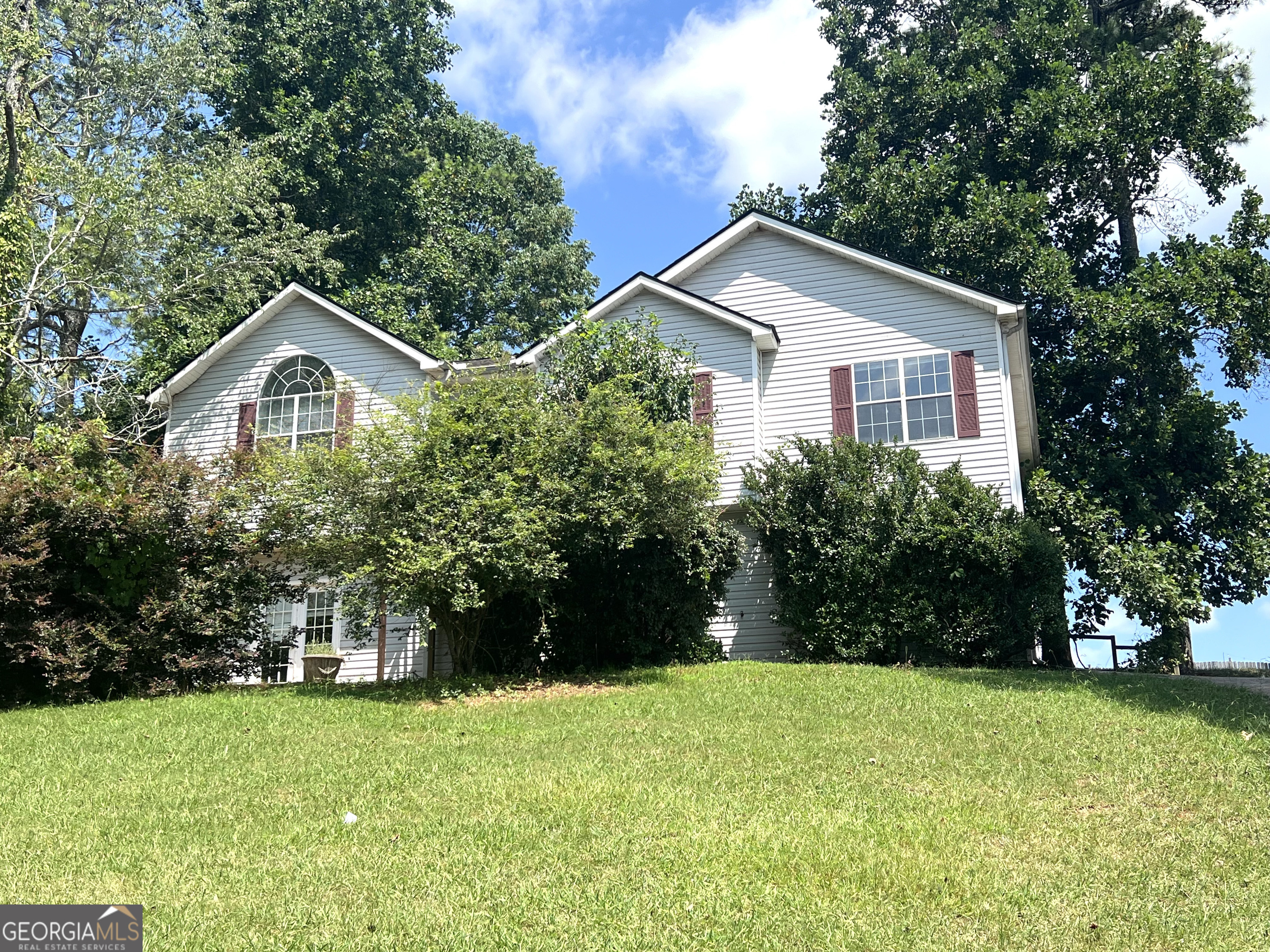 Welcome to 7780 Poppy Dr, a lovely home in Winston, GA. This property features a spacious floor plan with 4 bedrooms and 2 bathrooms, perfect for those needing extra space. Built in 2000, the home offers a comfortable living environment in a quiet neighborhood. You may be looking to invest in a long-term rental or your first home, this property offers the best of both worlds. Conveniently located near schools, parks, shopping, and major highways.