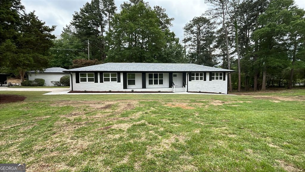 Photo of 2604 Flat Shoals Road SW, Conyers, GA 30094 (MLS # 10664252)