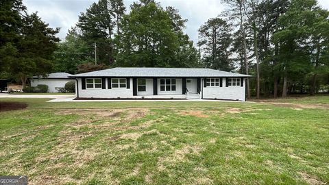 Photo of 2604 Flat Shoals Road SW, Conyers, GA 30094 (MLS # 10664252)