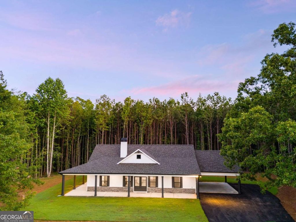 Photo of 5 Georgia Highway 100, Buchanan, GA 30113 (MLS # 10741449)