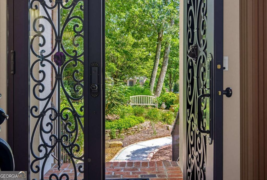 Photo of 7090 Laurel Oak Drive, Suwanee, GA 30024 (MLS # 10789835)