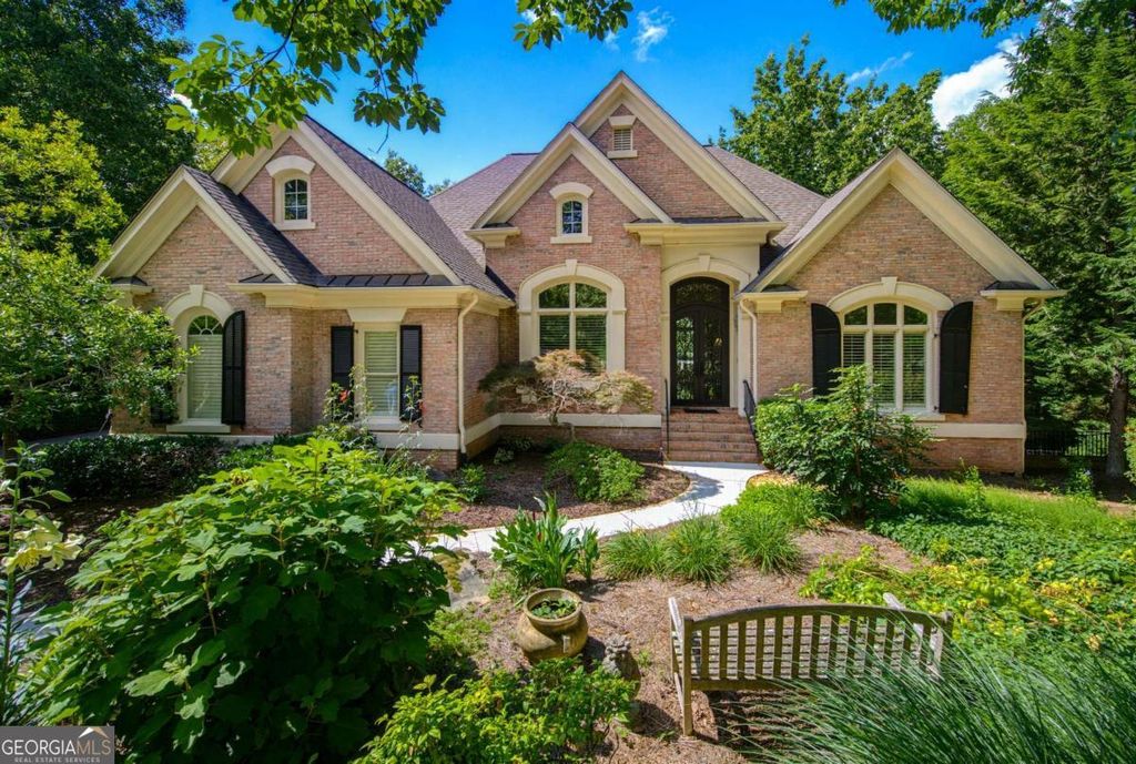 Photo of 7090 Laurel Oak Drive, Suwanee, GA 30024 (MLS # 10789835)