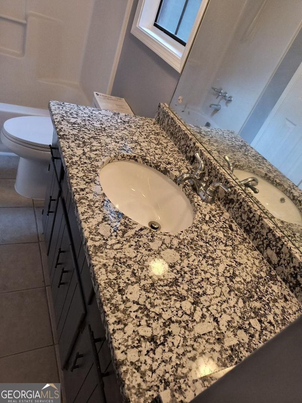 Photo of 2717 Stanton Woods Drive SE, Conyers, GA 30094 (MLS # 10663361)