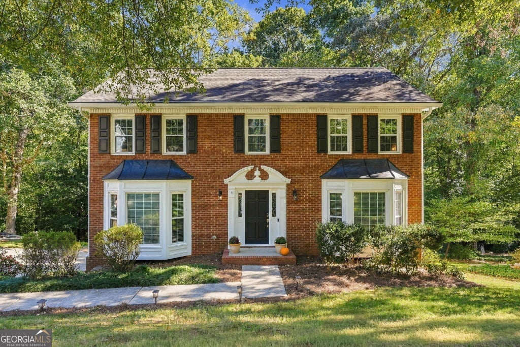 Photo of 1544 Thoreau Drive, Suwanee, GA 30024 (MLS # 10876847)