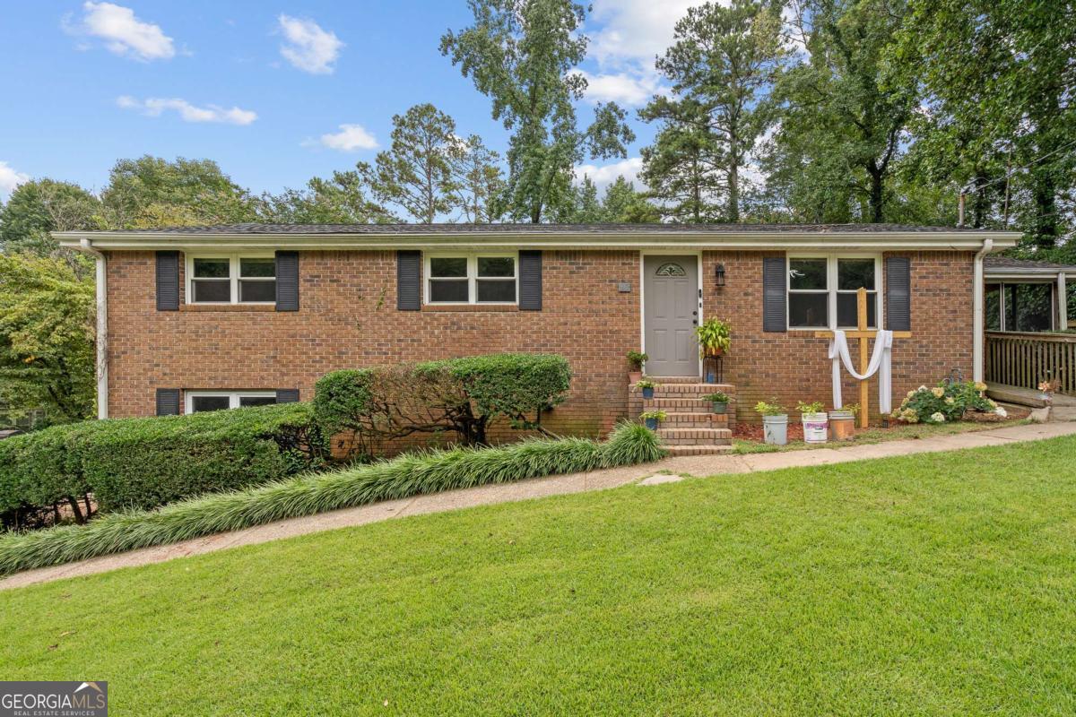 3 Bedrooms, 2 Bathrooms, 1 Opportunity to Love Carrollton Living! Welcome to your next home sweet home-just minutes from the heart of Carrollton! This charming brick ranch sits on nearly half an acre and offers the perfect blend of space, comfort, and convenience. With two separate driveways and two garages, there's room for everyone (and everything). Inside, you'll find a classic layout with thoughtful updates and plenty of potential to make it your own. Bring your vision and make this house your home!