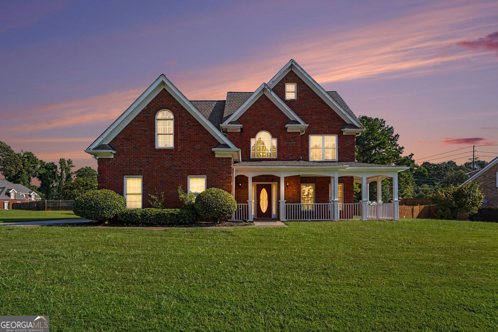 Photo of 2002 Evergreen Drive SE, Conyers, GA 30013 (MLS # 10842828)