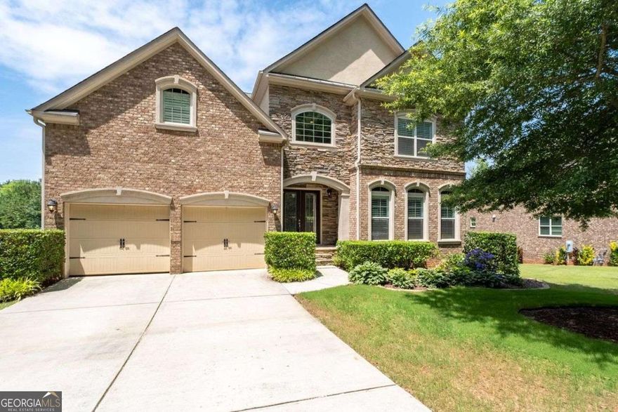 Just listed in the sought-after Canterbury Swim/Tennis Community-this stunning home offers nearly 6,000 square feet of luxurious living space in a resort-style neighborhood conveniently located near major highways, shopping, restaurants, and walking trails. Tucked away on a quiet cul-de-sac street, this 4-sided brick and stone beauty sits on a private .41-acre lot backing up to peaceful nature surroundings. Inside, you'll find an open floorplan with a spacious kitchen overlooking the great room, formal living and dining rooms, and a guest suite with a full bath on the main level. Soaring ceilings create an airy, grand feel throughout. Upstairs, the expansive owner's suite features a sitting area, walk-in closets, and a private bath with double vanities, a garden tub, and dual showers. Additional upgrades include a versatile loft area, an optional media room, new carpet, and upgraded hardwood floors. The finished basement provides even more space with a large recreation area, bedroom, and full bath-perfect for entertaining, multi-generational living, or a private retreat. This exceptional home truly has it all-space, comfort, and a prime location.