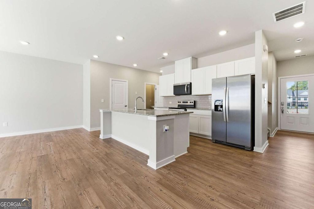 Photo of 1905 Westwind Street, Lawrenceville, GA 30043 (MLS # 10721715)