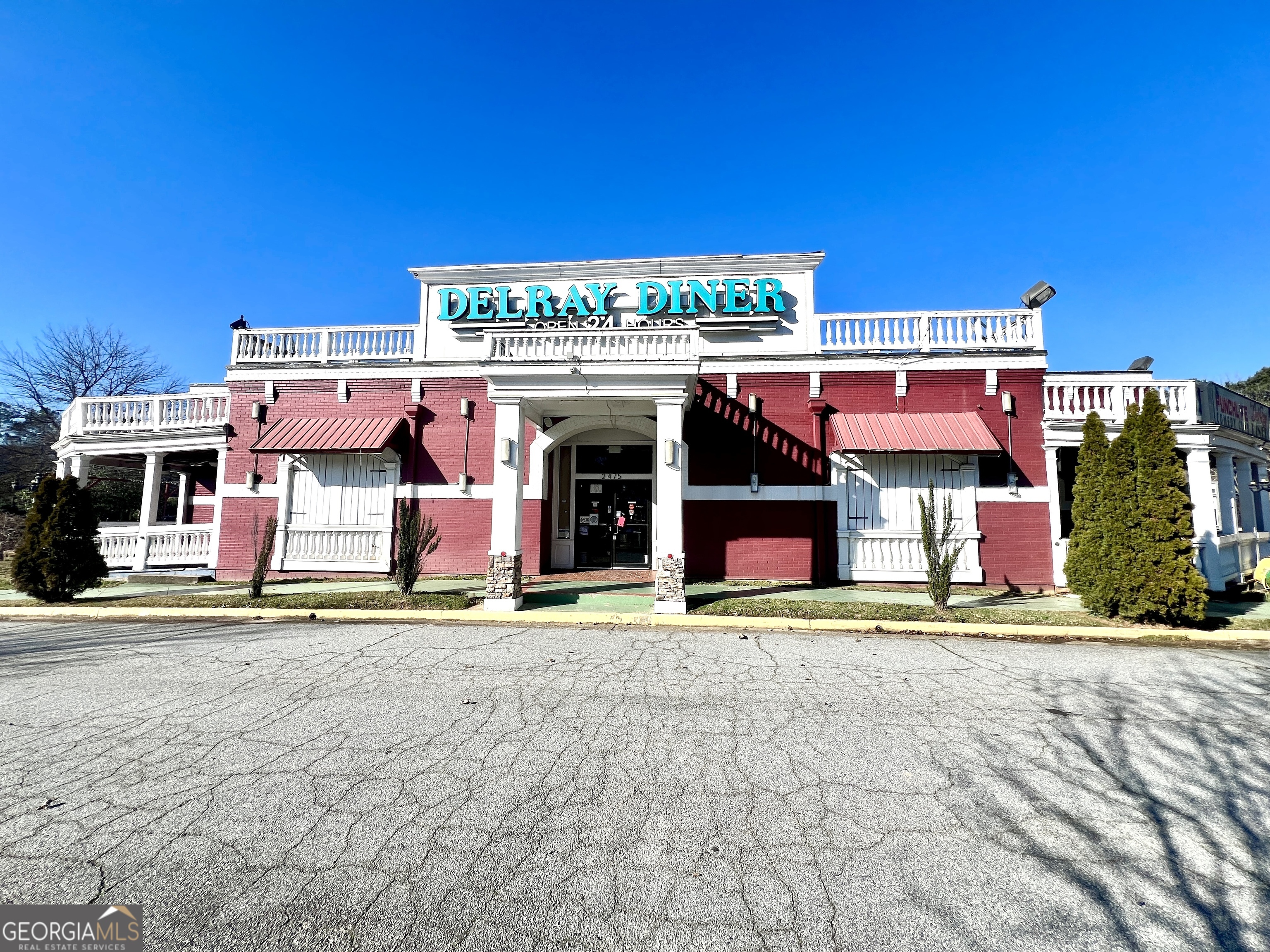 Prime 13,000 SF Commercial Property in Marietta at 2475 Delk Rd SE- Open Concept Space Ready for Development. Seller financing also available. Unlock the potential of this 13,000 SF commercial building on Delk Rd SE in Marietta, GA-a high-traffic location near major businesses, hotels, and entertainment. Previously a restaurant, the interior has been cleared and prepared for development, offering a versatile open-concept layout ready for customization. With flexible zoning, this property is ideal for a wide range of businesses or even redevelopment into a hotel, apartments, or condominiums. A+ Location with High Visibility & Endless Possibilities. Strategically located next to Courtyard Marriott, Fairfield Inn, Drury Hotel, Publix, McDonald's, IHOP, Ruby Tuesday, Chevron, and Racetrack Gas Station, this property benefits from Strong Daily Car Traffic, foot traffic and daily commuters. Just minutes from Truist Park and The Battery Atlanta, it sits in one of Marietta's most sought-after commercial corridors, making it an ideal site for businesses that thrive on exposure and accessibility. Flexible Zoning - Perfect for Many Uses This property offers limitless opportunities for investors, developers, and business owners, Some possibilities may include (please confirm with county zoning) including: * Hotel / Extended Stay Suites - Capitalize on the area's growing tourism and business travel. * Luxury Condos or Apartments - Ideal for residential development near retail, dining, and entertainment. * Restaurant / Bar - Take advantage of existing restaurant infrastructure for an easy buildout. * Retail / Showroom - High visibility location for flagship retail stores or specialty shops. * Medical or Wellness Center - Perfect for urgent care, dental offices, or holistic wellness facilities. * Co-Working Space / Corporate Offices * Ideal for modern office layouts and professional suites. *Event Venue / Church - Ample space for large gatherings, conferences, or worship services. *Fitness Center / Gym - A perfect location for a boutique gym, CrossFit studio, or training facility. *Storage / Distribution Hub - Excellent accessibility for last-mile delivery or logistics businesses. Why Invest in Marietta? Marietta is a booming Atlanta suburb with a pro-business environment, strong economic growth, and major redevelopment projects on the rise. New developments in the area include: *Franklin Gateway Revitalization - A multi-million-dollar mixed-use transformation. * East Cobb Mixed-Use Expansion - Adding upscale residential, retail, and office spaces. *The Battery Atlanta Growth - Expanding entertainment, dining, and residential options near Truist Park. With easy access to I-75 and I-285 just seconds away, Cobb Linc Bus Line access in front of location. this property connects seamlessly to Atlanta's job market, Hartsfield-Jackson International Airport, and major business hubs. Marietta's strong population growth, increasing home values, and business-friendly policies make this an exceptional investment opportunity. A Blank Canvas for Your Vision With a fully open-concept interior, this space is ready for your custom buildout or complete redevelopment. Whether you're looking to launch a new business, expand your portfolio, or transform this space into a high-performing commercial or residential asset, the possibilities are endless. Don't Miss This Opportunity! Exclusively Listed and Presented By: Equitable Realty, LLC Contact Us Today to Schedule a Tour.