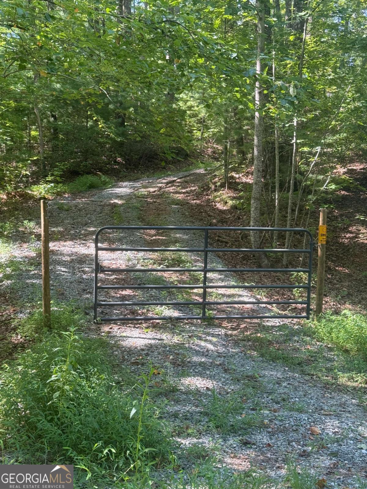 This property would make a excellent place for a primary residence, or secondary residence. Property has underground power in place, well in place, there is a septic tank on property. Property has a view, if willing to drop trees. Unrestricted property. $175 annual POA fee for road maintenance. Two community lakes for your enjoyment. All Roads are Gravel. There is a foundation on property, ask agent for details.