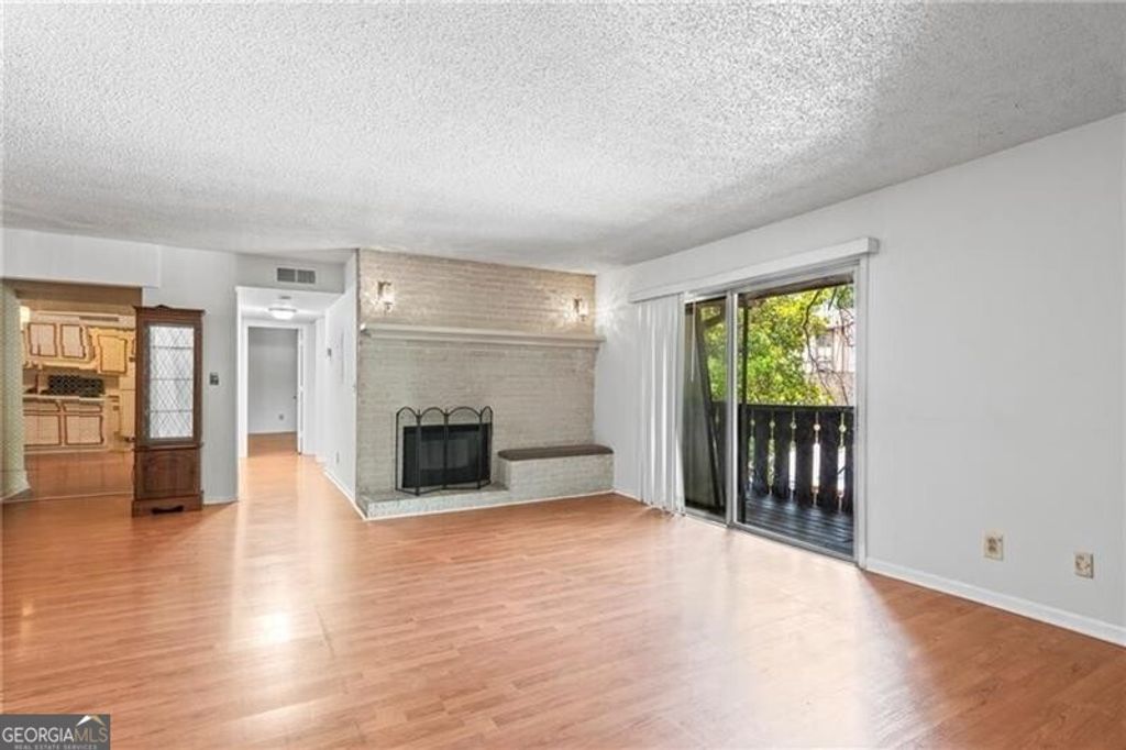 Photo of 1308 Camelot Drive, Atlanta, GA 30349 (MLS # 10670622)