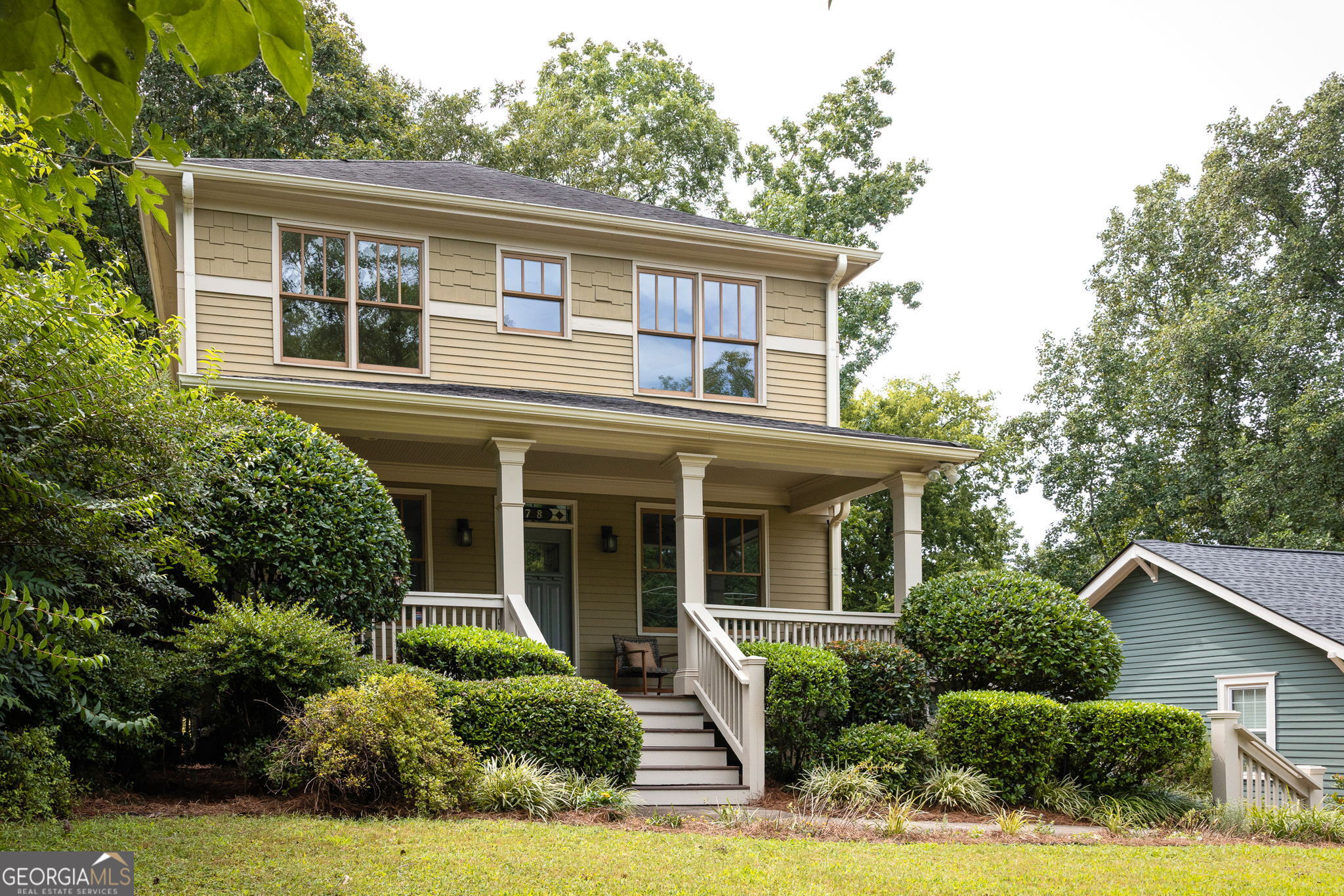 This home is more than a Craftsman. It's a backdrop for the life you've been dreaming about - with space to gather, room to grow, and the kind of charm that never goes out of style. Step inside from the welcoming front porch, and you'll feel the flow right away. From the entry foyer, you'll catch a sight line clear through to the back of the home - a glimpse of the open, connected layout ahead. To one side, a dining room dressed with coffered ceilings and judges paneling sets the stage for memorable dinners. To the other, a flexible room with a closet and full bath is ready to play whatever role you need - guest suite, home office, or creative space. The kitchen is the heart here, with freshly updated light fixtures, a new backsplash, neutral cabinetry, and an island built for gathering. In the family room, a gas fireplace with custom built-ins anchors the space, the perfect backdrop for cozy nights in or lively weekends with friends. Double French doors lead to one of the home's standout features: a screened-in wrap-around porch, complete with skylights, a gas line for grilling, and an open-air deck for sunny afternoons. Upstairs, two bright guest bedrooms share a dual vanity bath, with a linen closet close at hand. Laundry is thoughtfully placed upstairs, with extra storage and even a window for natural light. The primary suite offers calm and comfort, with a double-sided closet and brand-new bathroom featuring a double vanity with custom oak cabinetry, water closet, and glass-enclosed shower. Outside, the deep backyard is your own peaceful, nature-filled retreat. A spacious driveway with a motorized gate offers both convenience and security, plus there's plenty of room for additional off-street parking. And when you're ready to venture out, downtown Kirkwood, East Lake and Oakhurst are just a short stroll away - three of Atlanta's most beloved neighborhoods, each with its own unique mix of coffee shops, parks, and local dining.