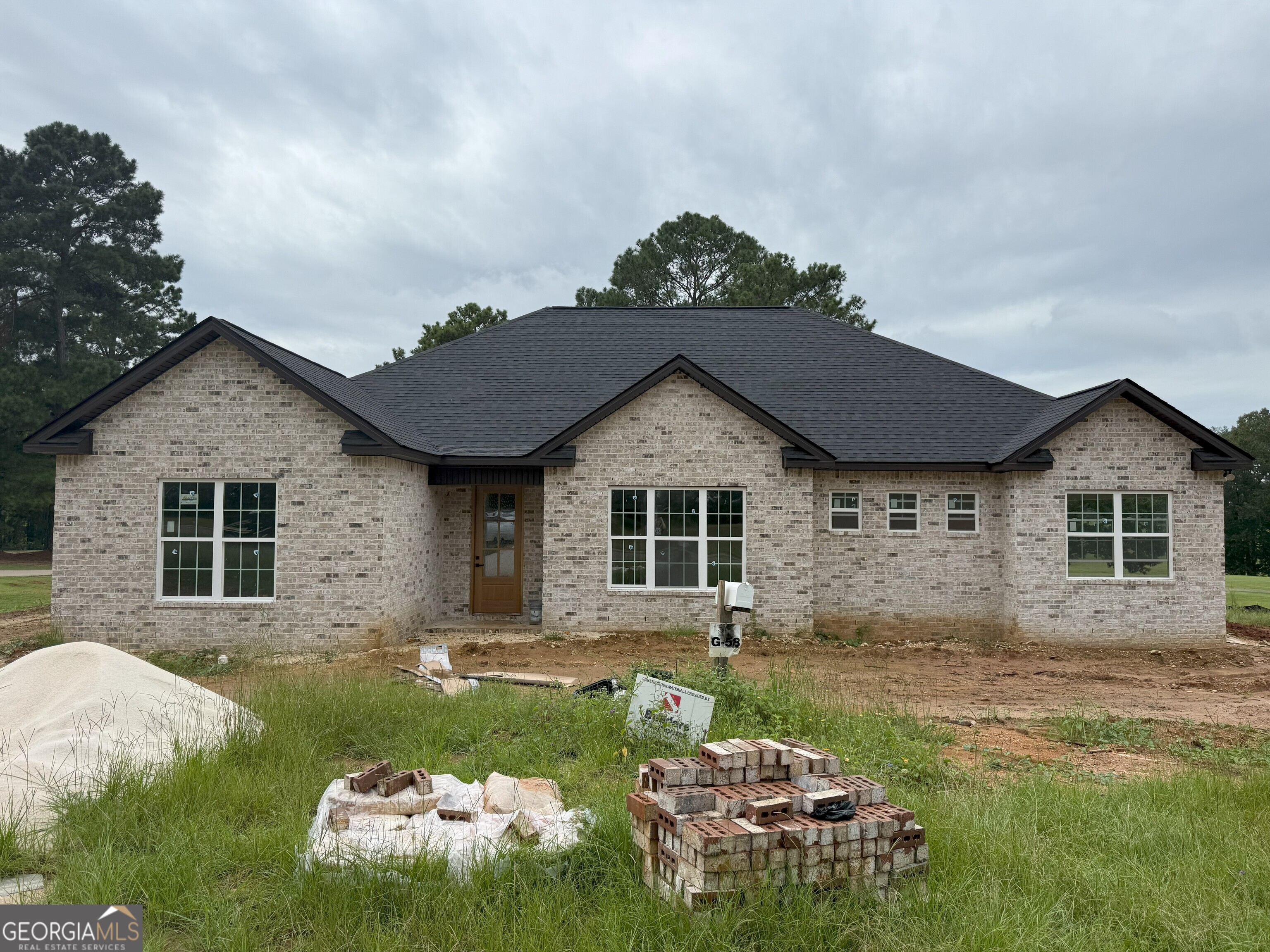 Southern Hills Golf Course Living at Its Finest! This stunning all-brick home offers 5 bedrooms, 3 bathrooms, and 2,250 sq ft of stylish, functional living space, perfectly situated on a half-acre lot with sweeping golf course views. Inside, you'll find luxury vinyl plank flooring throughout-no carpet anywhere-and thoughtful custom touches that make this home truly stand out. The heart of the home is the chef-inspired kitchen featuring a massive 10.5-foot granite island, gorgeous granite countertops, and plenty of space for cooking and entertaining. The spacious living area is highlighted by custom coffered ceilings, adding elegance and character, while oversized windows flood the rooms with natural light. Step outside to your back porch overlooking the golf course, the perfect spot to sip your morning coffee or relax at the end of the day. Highlights include: 5 Bedrooms | 3 Bathrooms 2,250 sq ft all-brick construction half-acre lot with golf course views Custom coffered ceilings 10.5-foot granite island & countertops LVP flooring throughout-no carpet! Spacious back porch for entertaining or relaxing This home combines elegance, comfort, and golf course living-all in one beautiful package. Don't miss your chance to call it home!