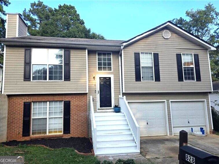 Photo of 828 tradd CT, stone mountain, GA 30087 (MLS # 10832869)