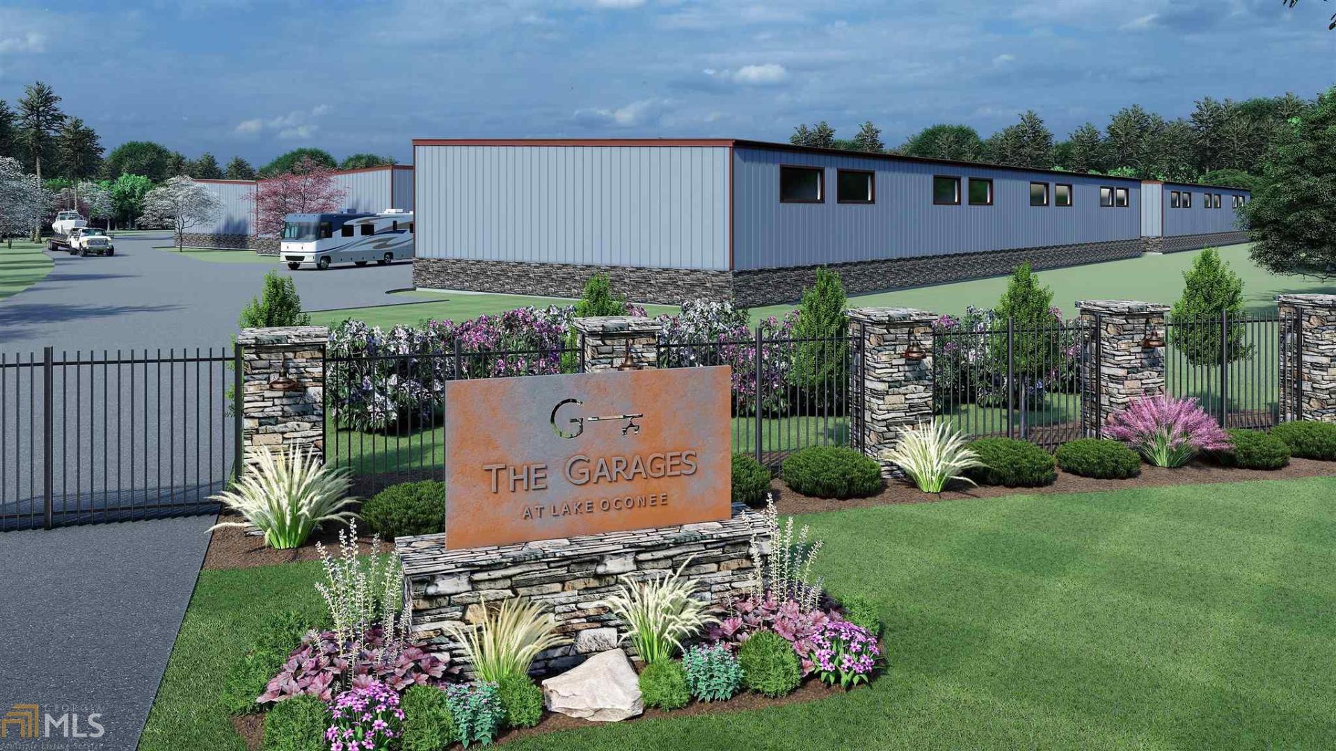 Construction is complete on Buildings A and B at the Garages at Lake Oconee, a luxury garage development, located off of Highway 44 in Greensboro, GA. Buildings C and D are starting soon. The 1200 SF units are fee-simple and flexible for many uses. Need a man-cave, diva den, she-shed, personal storage or storage for your business? With 18-20.5' ceiling height, you are able to store a large RV/motorhome, your boat or holiday decorations. Or you can use it to display memorabilia, host game nights or work on a custom car! Units can be customized with upgrade packages including cabinetry, flooring, mezzanines and security systems. Units are 22’ X 54.5’ and will come standard with many amenities, including HVAC, LED industrial lighting, 125 AMP service panel, 12’ X 14’ motorized garage door, a pedestrian door with transom window, restroom with toilet and lavatory with faucet, floor drains in restroom and unit and an industrial floor sink. Don't miss the chance to own you own storage!! They are selling fast.
