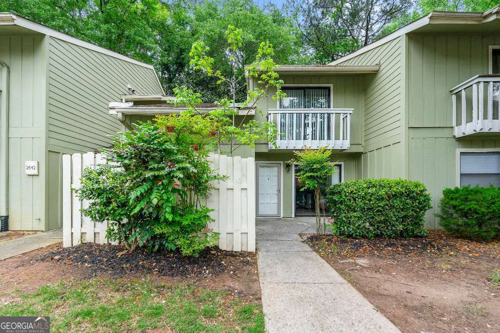Welcome to 2638 Stoney Creek Rd, a spacious and beautifully maintained 4-bedroom, 3-bathroom townhome in the heart of Marietta! This 1,896 sq. ft. home offers an open floor plan, perfect for entertaining and everyday living. The updated kitchen features granite countertops, modern appliances, and ample cabinet space. The home includes energy-efficient LED lighting and a brand-new whole-house HVAC system for year-round comfort. Enjoy the expansive covered sunroom, ideal for relaxing or entertaining. Upstairs, the large primary suite offers a walk-in closet and en-suite bath. Three additional bedrooms and a dedicated office provide flexible living space. The private fenced backyard is perfect for outdoor activities. Community amenities include a pool and playground. Prime location! Close to I-75 for easy highway access, with shopping, and dining nearby.