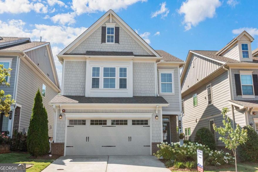 Welcome to Hedges Park just minutes from Historical Downtown Marietta & the vibrant Marietta Square! This move-in ready beauty exudes the comfort and style you've been searching for. When you step inside, you'll be greeted by warm, espresso-colored wood floors that flow throughout the lower level. The open concept gourmet kitchen is truly the heart of the home, featuring a spacious breakfast area, stainless steel appliances, wall oven with convection microwave, granite countertops, abundant cabinets, walk-in pantry & separate dining area. The family room adds its own appeal with custom shelves for your decor or your own library for avid readers and the gas fireplace makes it easy to cozy up on the couch with a cup of coffee or glass of wine (cheers!) and just in time for fall. The wall of windows overlooks the private fenced back yard that was recently landscaped & offers plenty of space for entertaining guests, grilling, kids play time or running room for your fury friends! Upstairs you will find 3 carpeted bedrooms & 2 full tiled bathrooms and a separate laundry room. The owners suite offers abundance of space, style & comfort with beautiful tray ceiling, wall of windows where natural sunlight flows and the bathroom features double vanities, soaking tub, walk-in tiled shower and large walk-in closet. And did I mention this is near the lively Marietta Square? Buckle up buttercup, because this lovely home is where charm, comfort, and convenience come together, all within walking distance to shopping, dining, museums, theaters, farmers markets, art shows, parks, trails, outdoor concerts, and more! Welcome Home!