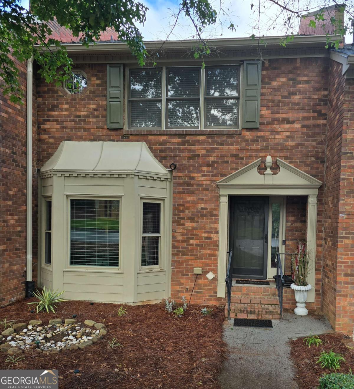 Stunning move in ready condo in sought after area. Minisplit installed in basement area (very own hvac system) Basement area can be a bedroom. Gas line installed for gas stove Walk-in closets with extra shelving. Oversized bedrooms. Complete with screened in porch with outer deck Walking distance or short drive to The Forum shopping, new Peachtree Corners Town Center (large green space, amphitheater, playground, shops/restaurants), Jones Bridge & Simpsonwood Park by the Chattahoochee River. Lots of guest parking. Community has a nice pool. Pictures were taken when furniture was in place... Agent/Owner