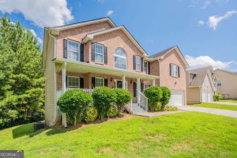 Photo of 275 Redding Ridge, Atlanta, GA 30349 (MLS # 10570864)