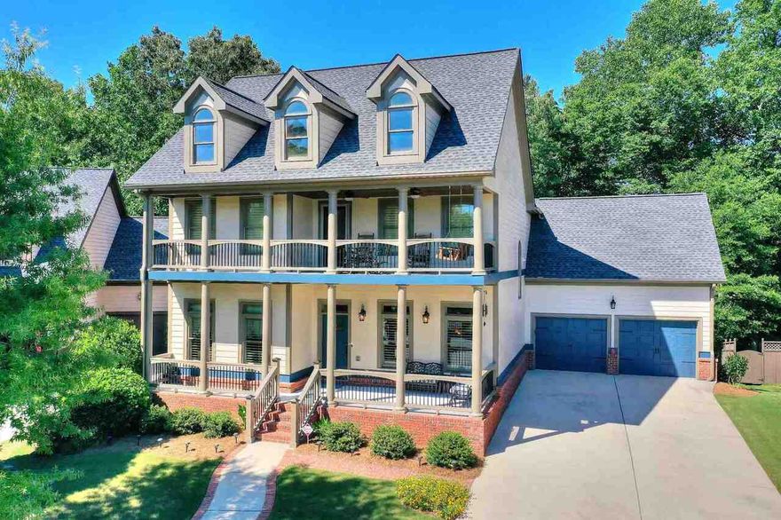 Welcome to this stunning home! Beautiful landscaping and lower and upper front porches greet you. Exquisite details keep your eyes moving from coffered ceilings to columns to double sided fireplace, crown molding and wainscoting. Plantation shutters throughout. Tall ceilings and hardwood floors throughout the main level and hardwoods on the 2nd floor as well. Entertain in your open kitchen and living/dining space. The kitchen boasts double ovens, custom cabinets, massive island, deep pantry and granite countertops. Enjoy your private backyard from the screened in porch. Upstairs laundry with beautiful cabinetry and a sink. All bedrooms have access to a bathroom, 3 upstairs and one downstairs. The basement has 2 finished rooms and tons of storage. Grayson High District! Swimming pool, lake and playground. Close to the Railyard with shopping and restaurants, Grayson Park and the Grayson library.