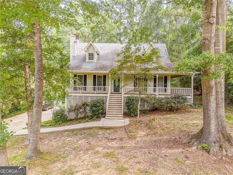 This charming 2-story home sits on over half an acre with a quiet, private setting and no HOA. Enjoy mornings on the wrap around porch and step inside to a 3 bedroom, 2 bathroom home with new LVP throughout. Located in a sought after school district, this home offers space, comfort, 2 car garage, and convenience without any restrictions. Your new home is right here!