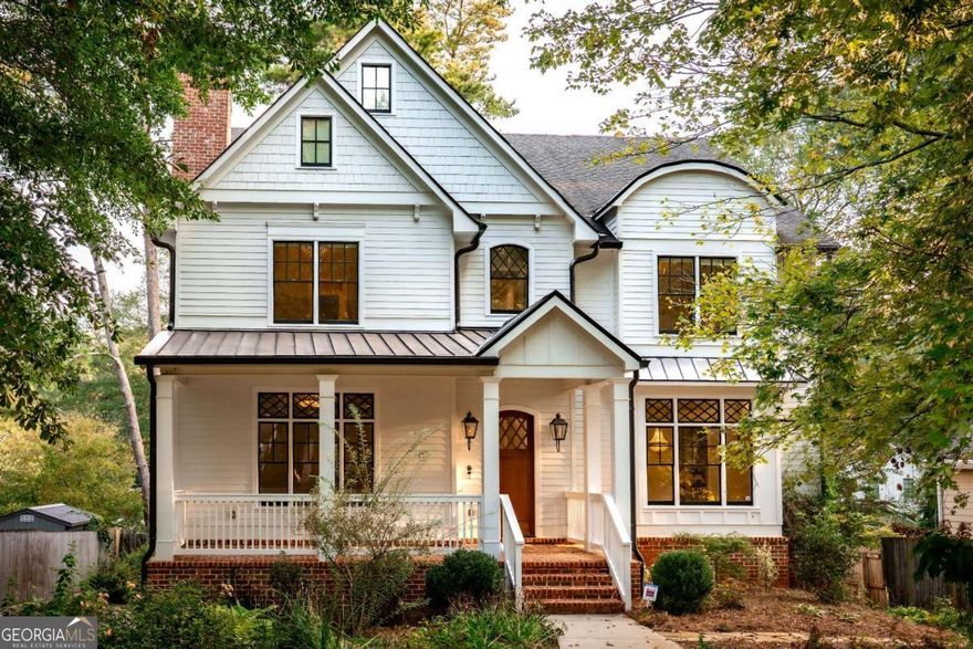 Possibly one of the most bespoke homes in the Midway Woods neighborhood, this custom-built home has details that are beyond jaw dropping. This isn't your regular 5 bedroom, 4 and a half bathroom home, this is a work of art. From the moment you walk in, you are greeted with warmth and light cascading through oversized windows in both the dining room and the living room. The kitchen and the great room are seamless with direct access to a large porch made of Purpleheart wood overlooking the landscaped backyard. The upgrades in the kitchen include quartzite counters (also throughout the entire home), JennAir appliances (the range is dual fuel, has gas burners, and a griddle), and a walk-in pantry with a "plumbed" coffee bar - literally no detail is overlooked. Have your coffee in front of one of the two fireplaces on the main floor - both with gas starters and one that is wood burning. There is an ensuite bedroom / office on the main floor and another half bath for guests. All of the bedrooms have custom walk in closets and the vaulted ceilings with crown molding are an extra touch. In fact, don't worry about noise either because all the doors are hardwood and the walls are soundproofed. The primary bedroom is a home of its own - with so much usable space, private deck, and a bathroom you'd like to spend hours in - with a double steam shower, MTI stone soaking tub, double vanities, and massive closet. Relax on one of your three porches, or in your hot tub, do some planting in your greenhouse, or workout in your gym area in the basement. If the power goes out, there is a whole house generator. If we have a drought, there is a dual irrigation system. If you want hot water instantaneously (who doesn't), there is a recirculating valve. If you want to listen to music throughout the house and watch tv at the same time, you can. This is a true smart home made for the most discerning buyers. 1271 Fenway Circle is an outstanding work of craftsmanship.