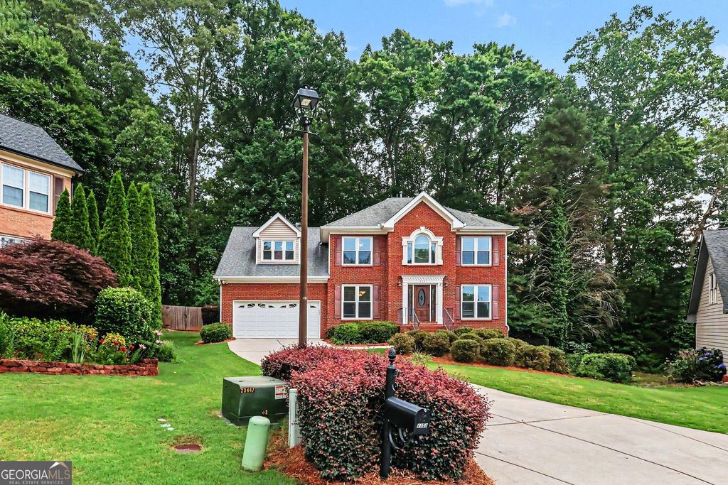 Photo of 1151 Cedar Bluff Trail SW, Lilburn, GA 30047 (MLS # 10770794)