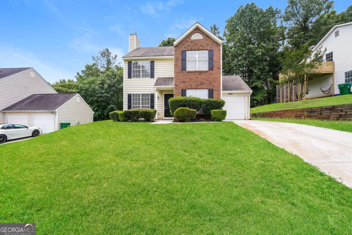 Welcome to this lovely traditional home in a prime Lithonia location! The spacious living room flows seamlessly into the dining room, which opens to the heart of the homeCothe kitchen. Featuring white cabinets, gas stainless steel appliances, and a pantry, the kitchen is perfect for everyday living and entertaining. Enjoy your morning coffee in the bright breakfast room with a breakfast bar and laundry closet. Adjacent to the kitchen, the extra-large fireside family room provides a cozy retreat, with convenient back stairs leading up to the second level. Upstairs, you'll find a versatile multi-purpose bonus space/3rd bedroom, along with two additional secondary bedrooms and a hall bathroom. The primary suite offers a peaceful escape, complete with a walk-in closet and a private ensuite bathroom featuring a separate tub and shower. This home offers such comfort and convenience in a fantastic location!