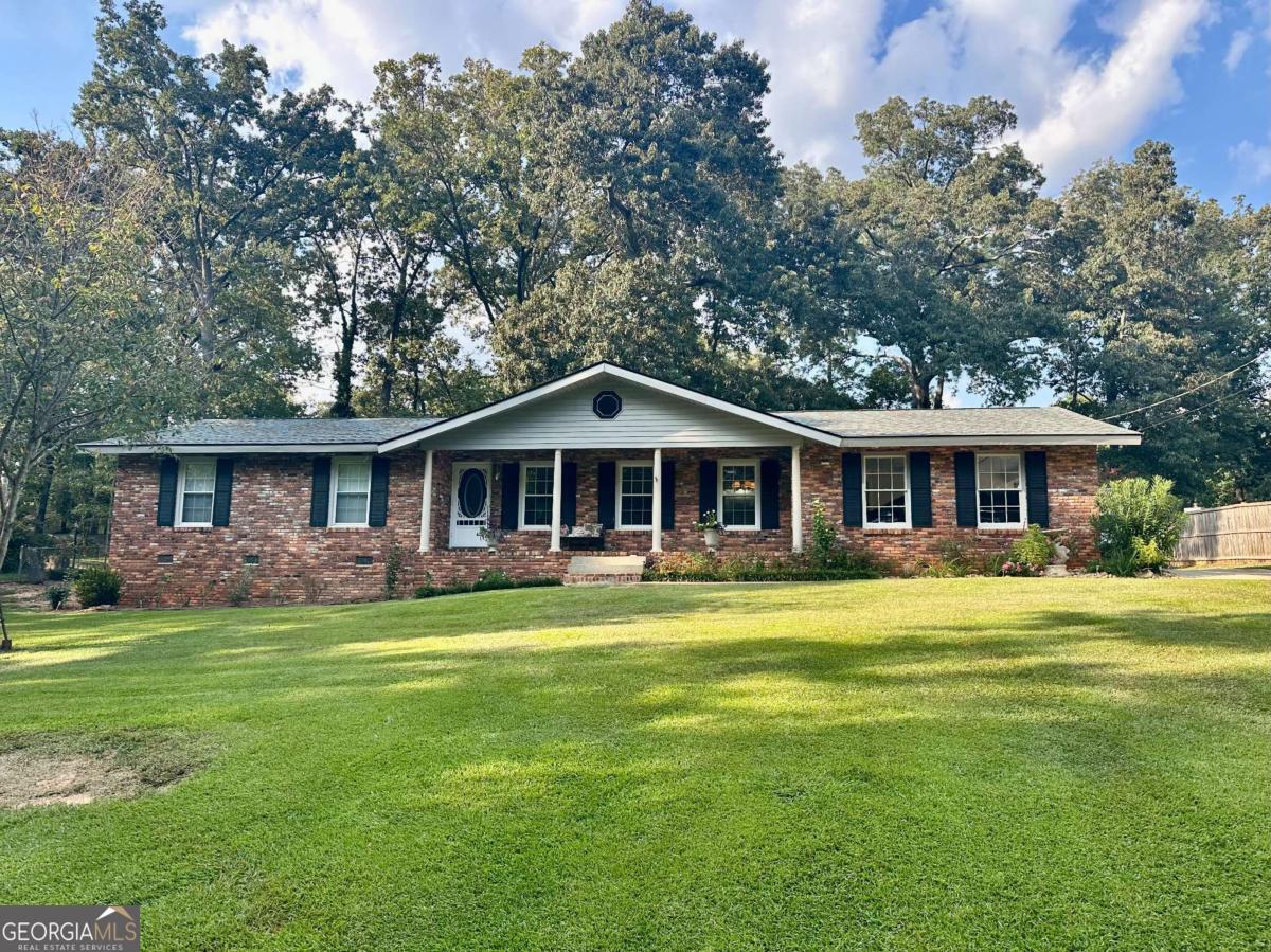Charming 3 bedroom, 2 bath home on a spacious 0.73-acre lot in a quiet, established neighborhood. This well-kept home features an updated kitchen with new LVP flooring, a large enclosed back porch, and plenty of upgrades throughout. Enjoy a fantastic location just minutes from Robins AFB, shopping, and dining. A very clean and move-in ready home with space to enjoy both inside and out!
