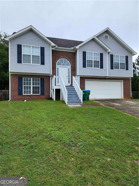 AWARD WINNING TOP BROOKWOOD SCHOOL DISTRICT. This 4 bedroom 3 full bathrooms split level traditional home is in a quiet neighborhood! Large yard, deck right off kitchen. Upper-level features primary bedroom with garden tub and walk in closet and two additional bedrooms. Separate dining area adds to the beauty of the main floor. This home has hardwoods throughout the upstairs. Downstairs has one bedroom and an oversized bonus room great for an extra family or entertainment area. There is lots of storage space in the garage. Home is located in a Cul de sac.