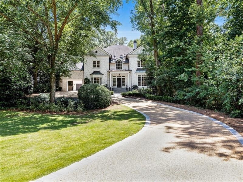 Traditional home thoughtfully designed by Harrison Design sits on coveted and revered Peachtree Battle Avenue with a gorgeous manicured rolling front lawn. Dramatic entrance foyer leads to formal dining room and formal living room with fireplace. Renovated kitchen opens to the keeping room and breakfast room in the back of the house overlooking the pool and offering alot of natural light. Upper level staircase leads to 5 bedrooms and 4 full baths including oversized primary suite with walk-in closet and luxurious bath. Finished basement has living space, recreation room with half bath and access to the backyard. Beautifully manicured grounds include pool, pool house, 2 car detached garage with additional unfinished space above. This home also includes a very private setting and sits far back from the street. Parking pad and convenient porte-cochere with side entry into the kitchen. Truly a "must see" home in Haynes Manor!