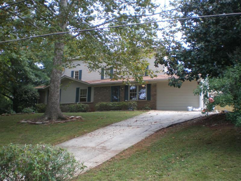 SPECTACULAR - MUST SEE INSIDE! Much bigger than it looks! TWO BIG MASTER BEDROOMS (1 upstairs, 1 downstairs); Stunning hardwoods in main living areas; Gourmet kitchen w/ SOLID GRANITE countertops, TILE BACKSPLASH, STAINLESS appl, high-end cabinets, HUGE PRIVATE FENCED BACKYARD; TILED bathrooms; upstairs master bath has JETTED TUB and DUAL VANITIES, FLAGSTONE floors & bath enclosure; Downstairs bathroom w/ GRANITE vanity top & glass vessel sink; HUGE 24'x12' Sunroom; 2-STORY REAR DECK overlooking spectacular backyard; VERY CONVENIENT neighborhood in HEART OF SMYRNA; only 5 minutes from I-285, I-75, VININGS, or Smyrna Market Village - and close to Truist Park! Owner-Agent