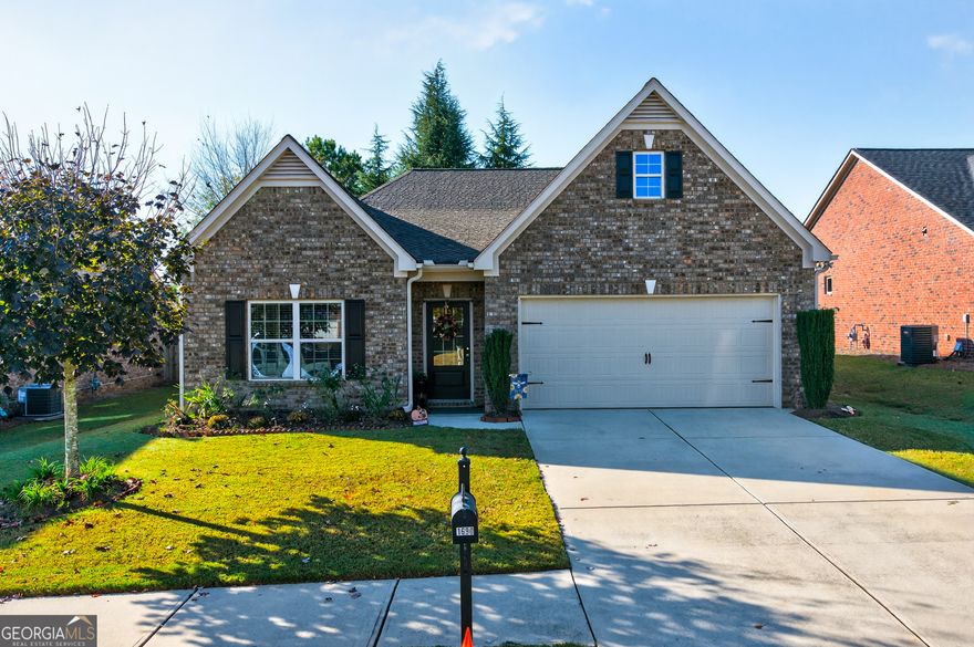 Welcome to this beautifully maintained 3-bedroom, 2-bath home located just minutes from the Cumming City Center and other local amenities. Featuring an inviting open-concept living area, this home offers the perfect blend of comfort and functionality-ideal for entertaining family and friends.    The spacious kitchen boasts granite countertops, ample storage, and a large walk-in pantry, making meal prep a joy. Relax in the light-filled living room or step outside to the back patio with a retractable awning, where you can enjoy your morning coffee or evening gatherings in any weather.    The fenced backyard is a private retreat, highlighted by lush gardens that create a peaceful, picturesque setting. With thoughtful details throughout and a convenient location close to shopping, dining, and recreation, this home truly has it all.