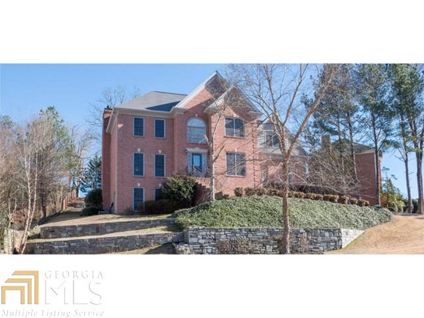 Prime Peachtree Corners location! Lovely 3 sided brick traditional, this home welcomes you to a unique, and inviting floor plan. The main level features a large living room, dining room and cheerful, warm kitchen with breakfast area. Upstairs find a spacious master bedroom with sitting area, and big walk in closet. The master shower shows off seamless shower glass doors and beautiful tilework. Secondary bedrooms are a good size also. Other great features include new whole house interior paint, hardwoods on the main, a newer roof, and a basement with 3 finished carpeted areas, which is stubbed for bath, and has lots of storage. Seller is offering a 1 year home warranty. Great schools! Ready for move in!