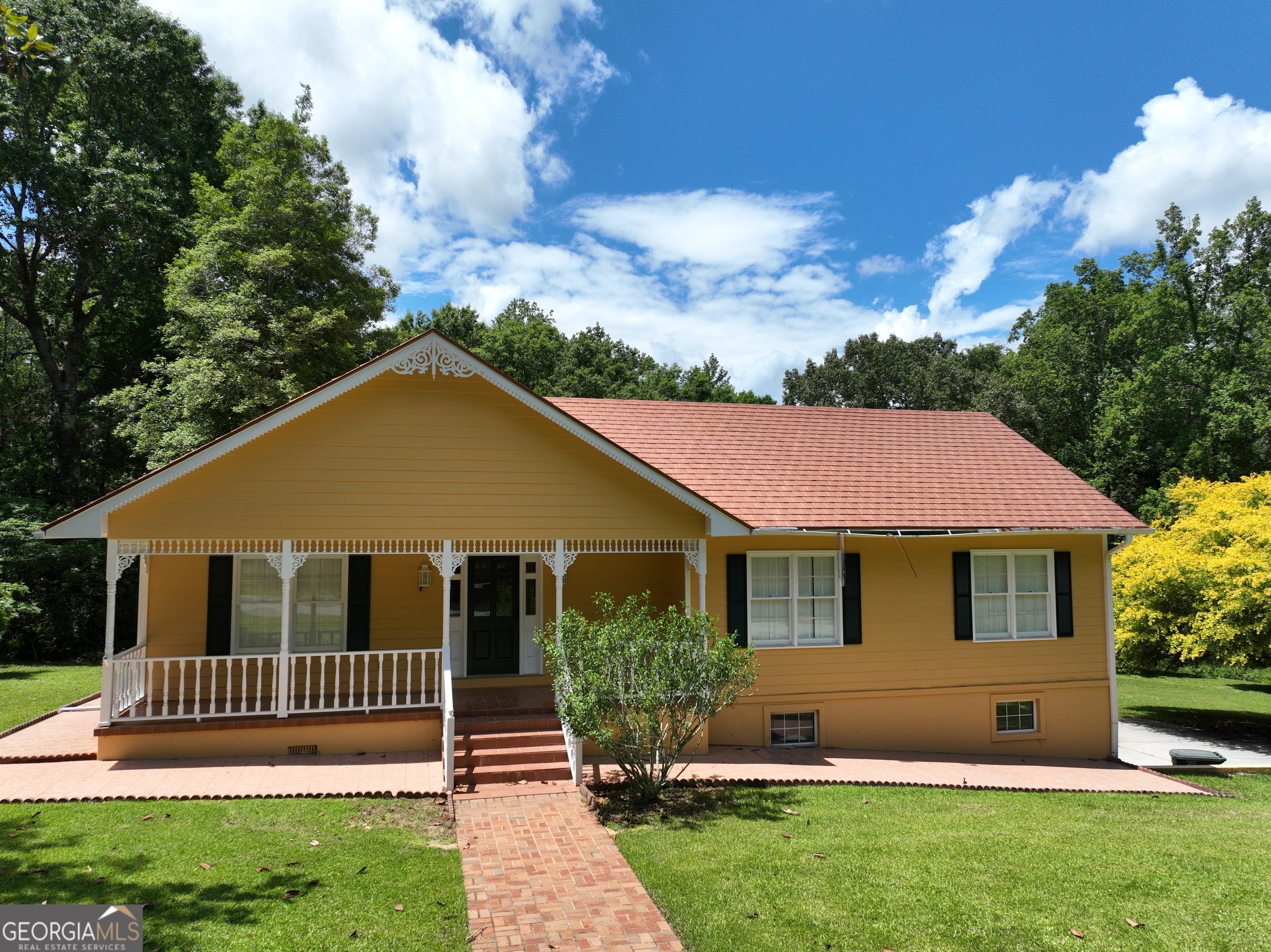 BACK ON THE MARKET -- ABSOLUTELY NO FAULT TO SELLER! This AS-IS property offers a rare opportunity in the established Holly Hills neighborhood. Priced in line with a recent appraisal, the home is set on a picturesque lot surrounded by mature magnolias, tile walkways, and a backyard pond with a gazebo-an ideal setting for renovation or restoration. The home features what appears to be a copper tile roof, a private balcony off the primary suite, three bedrooms and two baths on the main level, plus a family room, dining room, kitchen, and sunroom. The basement includes a laundry area, third bathroom, and three additional rooms that could serve as flex space, storage, or potential bedrooms, along with a double garage and extra storage areas. Due to visible signs of deferred maintenance and structural concerns-including confirmed termite damage to sections of flooring in the bedrooms and the possibility of additional hidden damage-this property will not qualify for FHA, VA, USDA, or conventional financing. Wildlife activity has also been observed in the attic, and sections of Masonite siding show deterioration. Buyers are strongly advised to conduct their own inspections and due diligence. Cash or specialty renovation financing only. Inspection report available upon request. Property is being sold AS-IS.