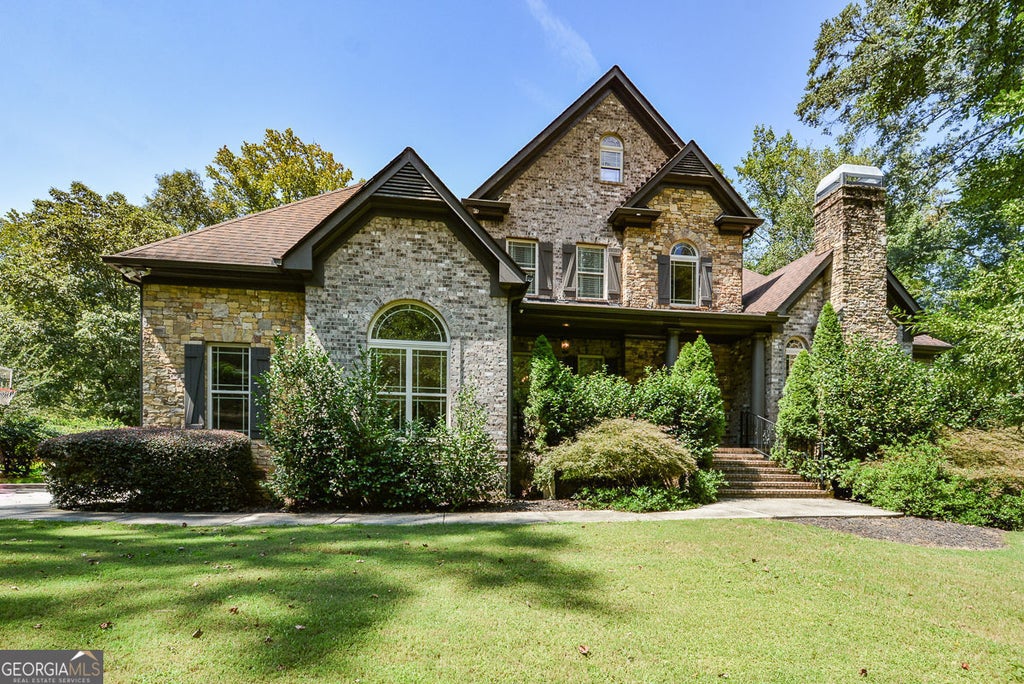 Photo of 2210 Spalding Drive, Atlanta, GA 30350 (MLS # 10875941)
