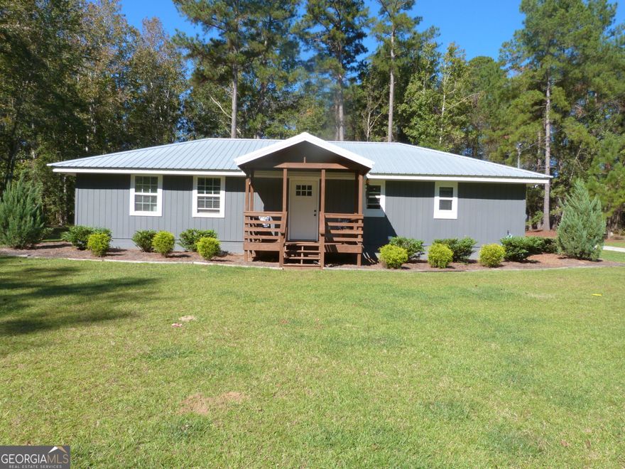 Looking for quiet country living - this move in ready 2 bedroom, 2 bath home could be the perfect place for you!  The home has been completely renovated within the last 3 years and has an open floor plan.  Quartz countertops, new cabinets, LVP throughout and more. Located only a few minutes from Sylvania and is an easy commute to Statesboro.  Storage building is included and the newly added two car garage has storage shelves and a workbench added.  Call today to make your appointment.
