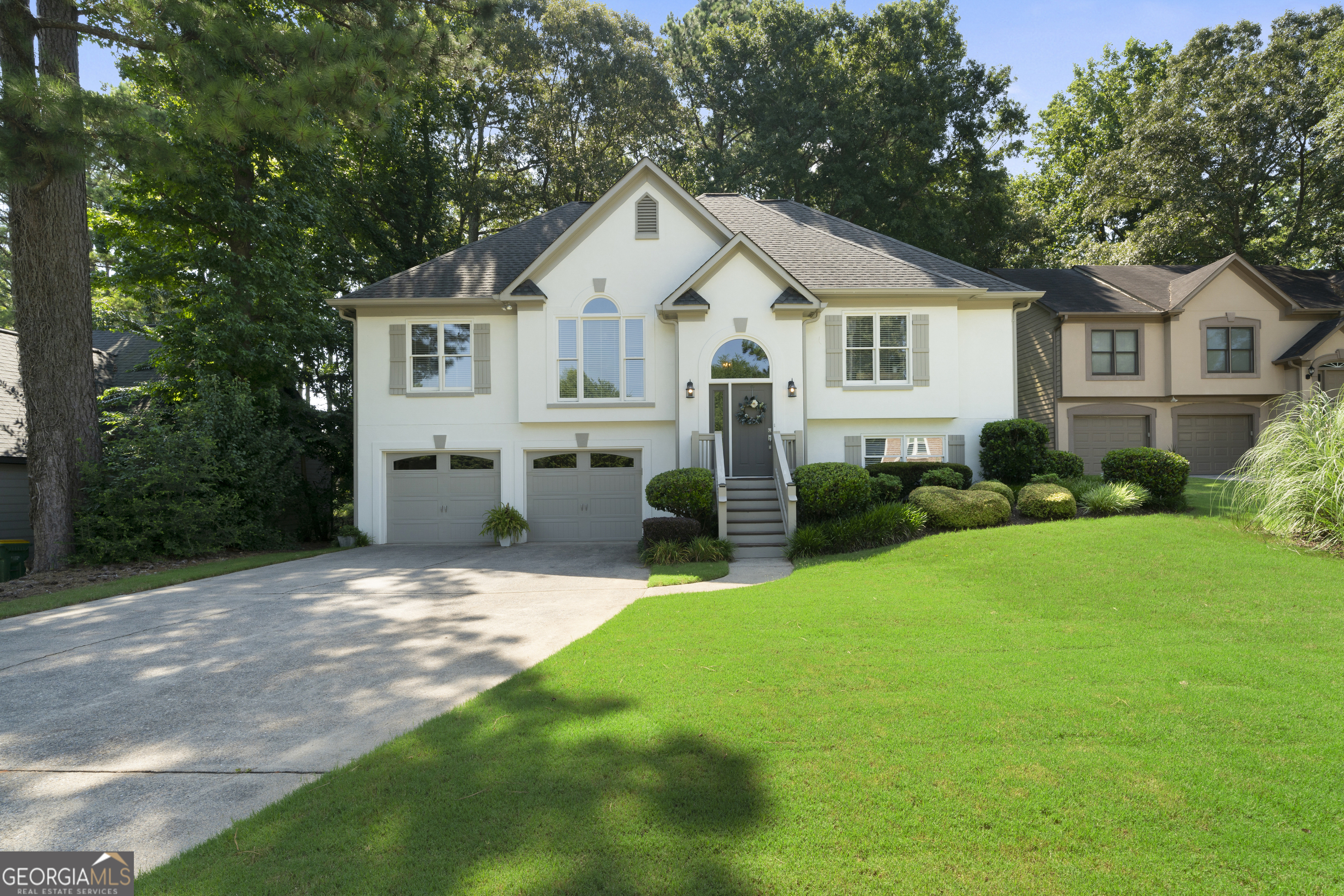 Fabulous home sitting on a wooded/private lot that is walking distance to the community's award winning amenities! This home features 4 bedrooms, 3 full baths. This home offers a large family room that has a vaulted ceiling and is open to the kitchen and breakfast area. The kitchen, is the heart of this home as it is open to the family room, dining room and the breakfast area. The original owners of this home have made beautiful upgrades and updates to this home which include upscale countertops and backsplash along with stainless steel appliances. Your buyers will appreciate the screened porch that is in addition to the upstairs deck, both overlook a fabulous wooded lot offering wonderful entertainment areas or just areas to unwind after a busy day! You will certainly appreciate the finished space in the basement that offers a large family room, as you enter, you will love the beautiful barn door! There is also a gorgeous updated bathroom and bedroom, ideal for a teen suite or just a perfect guest space! There are so many loving details, even the garage has custom cabinets and flooring. The community offers award winning schools and amenities! This home offers walking distance to the playground, pool, tennis and pickleball courts!