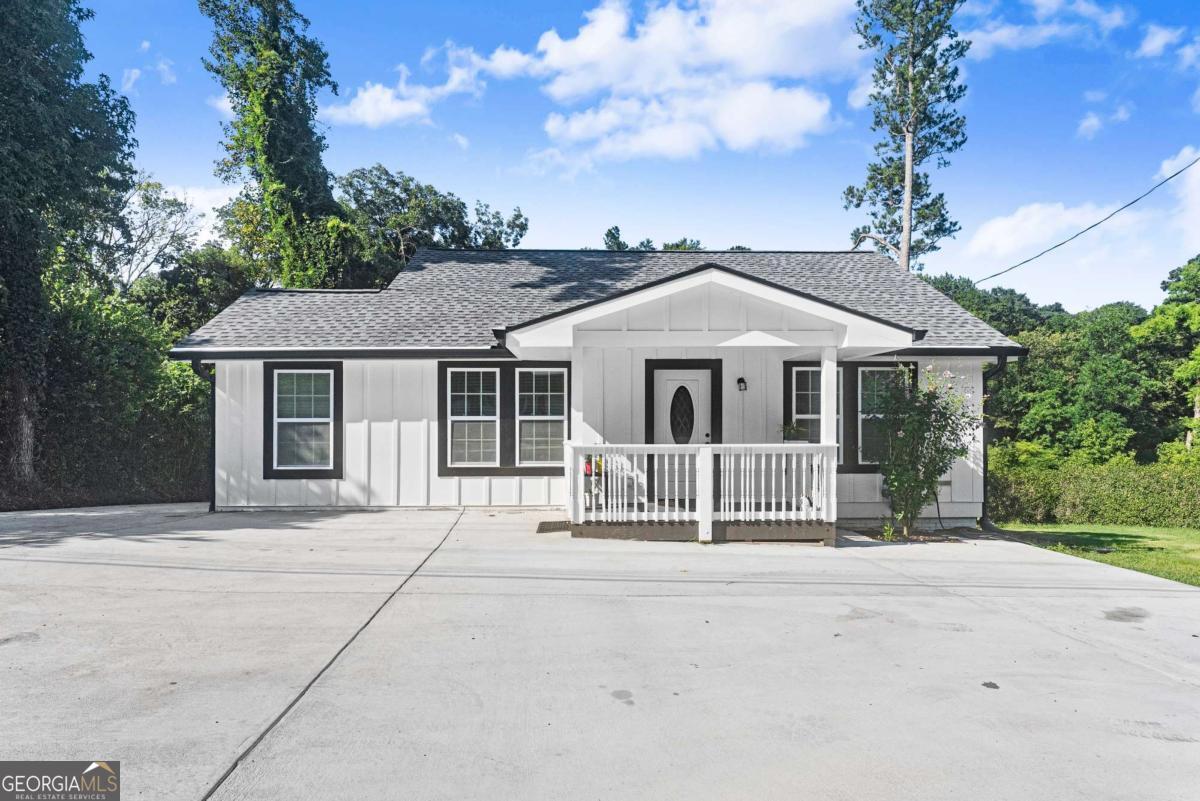 Fully Renovated 3BR/2BA Home on Commercial Lot - Prime Austell Location No HOA Almost new construction! This beautifully renovated 3-bedroom, 2-bath home sits on a 0.299-acre commercial-zoned lot along Austell Powder Springs Rd, offering endless potential for both residential living and business use. Step inside to an open-concept layout featuring granite countertops, recessed lighting, and beautiful flooring throughout. The spacious kitchen with bar seating flows seamlessly into the dining and living areas, perfect for entertaining or everyday living. Recent upgrades include a brand-new roof, HVAC system, plumbing, electrical, and a large back deck, providing peace of mind and low-maintenance ownership. With no HOA, excellent road frontage, and plenty of space for commercial vehicles and equipment, this property is ideal for business owners in landscaping, roofing, concrete, or similar trades with storage needs. Conveniently located near schools, shopping, and major highways. Whether you're looking to live, work, or invest, this versatile property checks all the boxes. You don't want to miss out! This property is occupied - please schedule an appointment!
