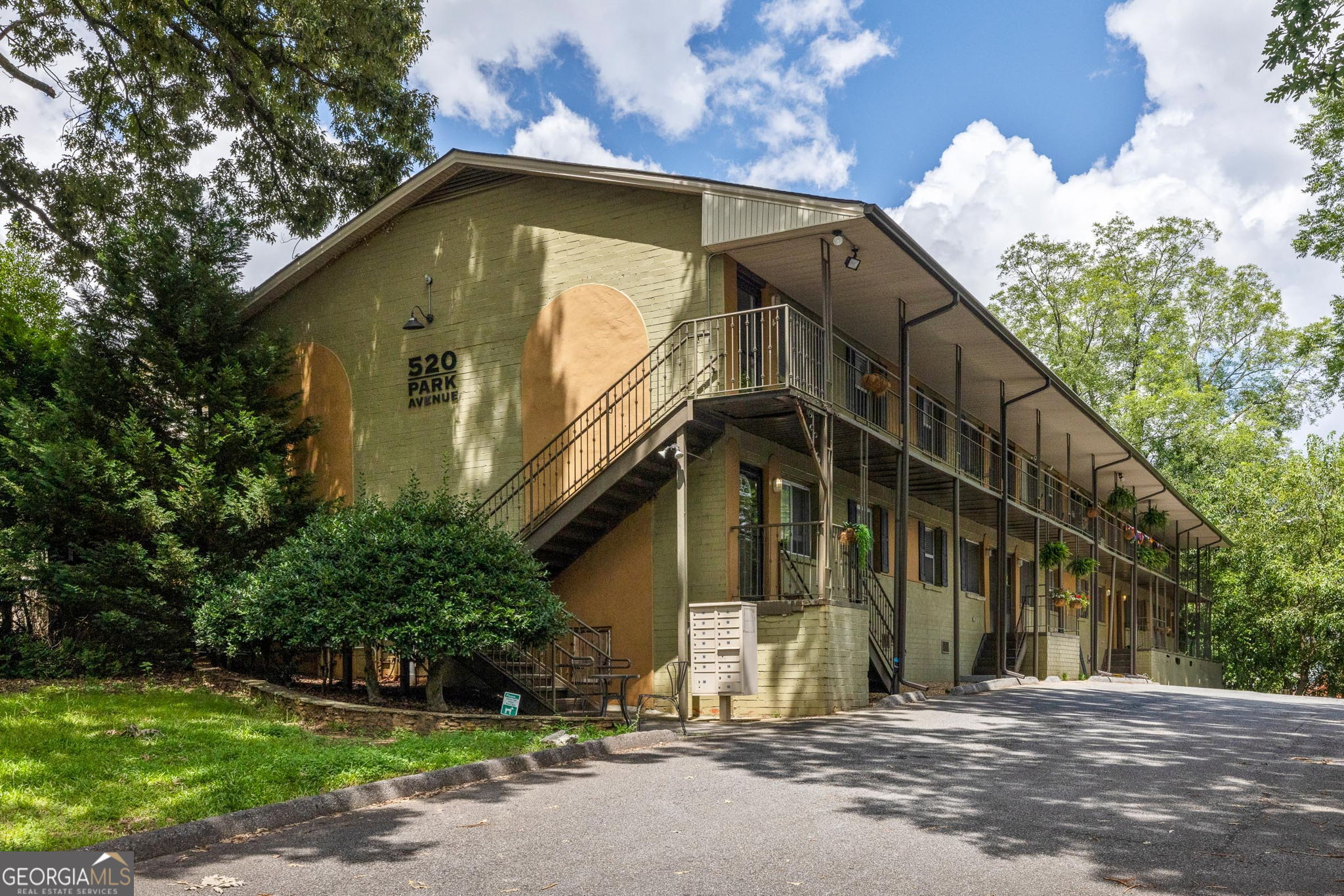 Welcome Home ATL to this top-floor end unit overlooking the beloved Grant Park! A serene sanctuary nestled in the heart of one of Atlanta's most iconic neighborhoods, this home is tucked within a quaint, highly sought after community that offers charm, comfort, and unbeatable convenience! Enjoy a front-row seat to the Summer Shade Festival, the Grant Park Farmers Market, and the daily rhythm of a neighborhood that truly feels like home. Inside natural light pours through illuminating original oak flooring and a spacious, well-designed layout. The kitchen features a fresh tile backsplash and updated appliances, while the fully reimagined bathroom (taken down to the studs in 2020) boasts all-new tile, vanity, tub, and more! Thoughtful upgrades continue throughout, with custom closet systems, new blinds, UV HVAC purification, and a full interior paint refresh completed in 2025, making this home truly move-in ready. Outside, enjoy space to gather with neighbors, grow your favorite plants in sun-drenched corners, or unwind beneath the trees. With Glenwood Park's shops and services just around the corner, and walkability to Zoo Atlanta, Oakland Cemetery, and a host of beloved local restaurants, this peaceful perch delivers the perfect blend of privacy and connection. Do not wait, this top-floor, end-unit gem is a rare Grant Park opportunity you will not want to miss!