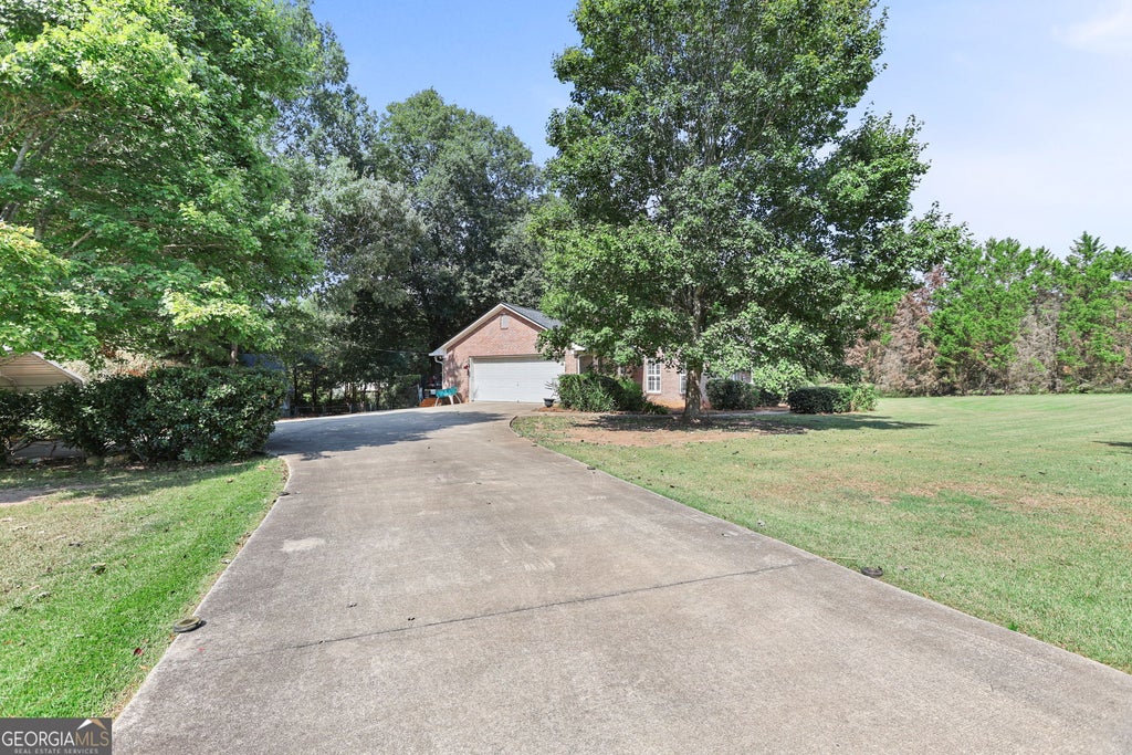 Photo of 448 Minter Drive, Hampton, GA 30228 (MLS # 10841086)