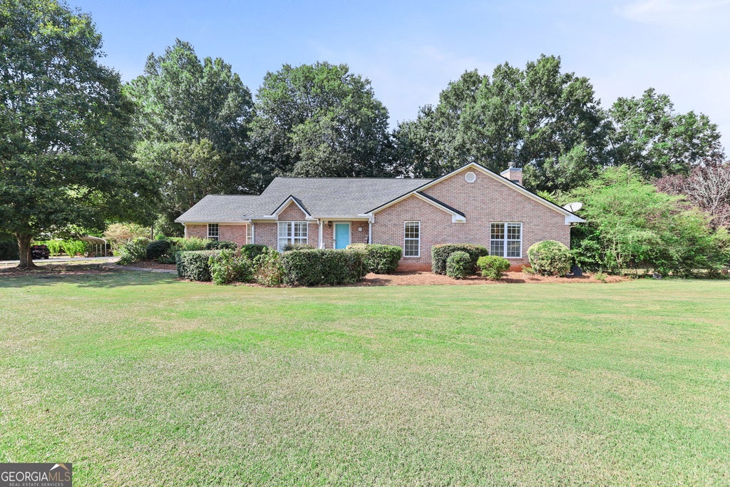 Photo of 448 Minter Drive, Hampton, GA 30228 (MLS # 10841086)