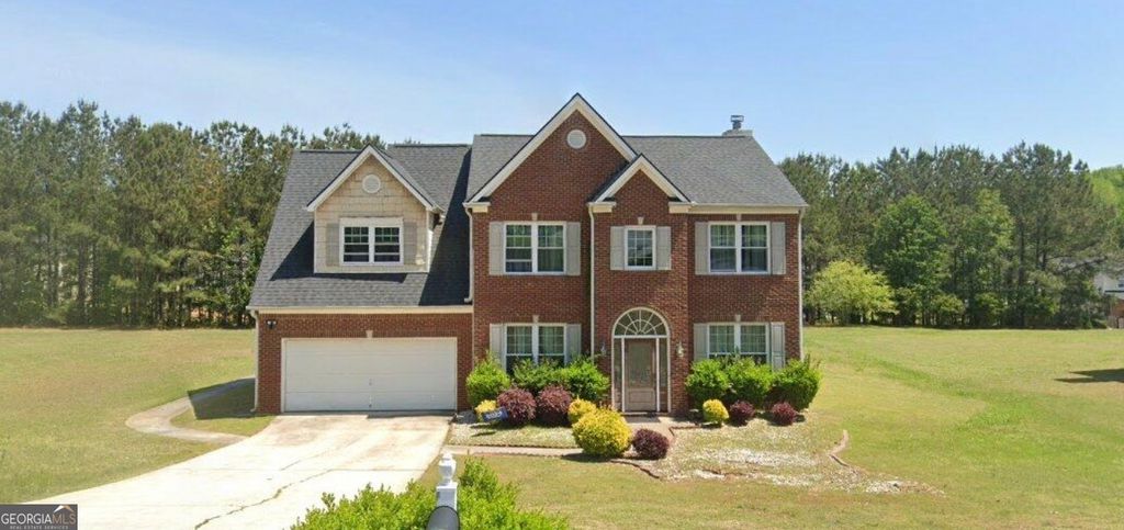 Photo of 965 Trotters Farm Rd, Fairburn, GA 30213 (MLS # 10685315)