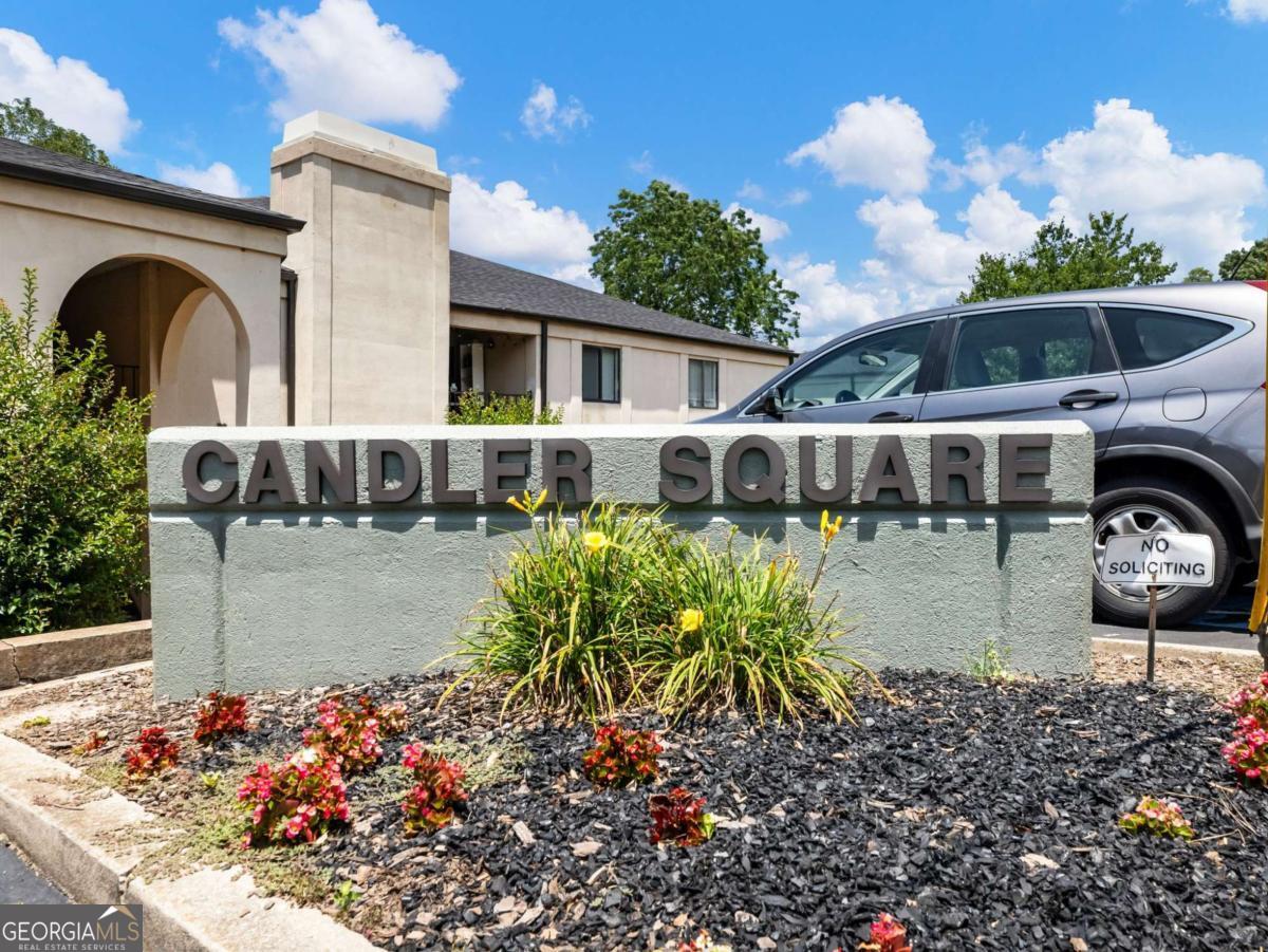 Welcome to this sparkling modernized three bedroom, two bath condo with large flex space that can be used as an office, formal dining room or second family room. This complex is walking distance to downtown Gainesville, Brenau University and adjacent to City Park where there are baseball fields, walking trails, football field, playground. This is a wonderful opportunity for any type of Buyer, investor or owner occupant. ALL new LVP flooring throughout, no carpet! The kitchen has all brand new stainless steel appliances, quartz countertops, marble backsplash and brushed gold hardware and farm sink. The large laundry room is large with a newer hot water heater. Full bathroom has brand vanity and brand new shower/tub with all new light fixtures throughout. Each bedroom has new remote control operated ceiling fans. The primary suite has a private patio and walk-in closet with private bathroom with custom tile shower with glass shower door. The dual vanities in the bathroom are perfect for sharing. There is an additional covered back porch overlooking the baseball field and greenspace to easily play on or walk pets. Building exterior was just freshly painted.