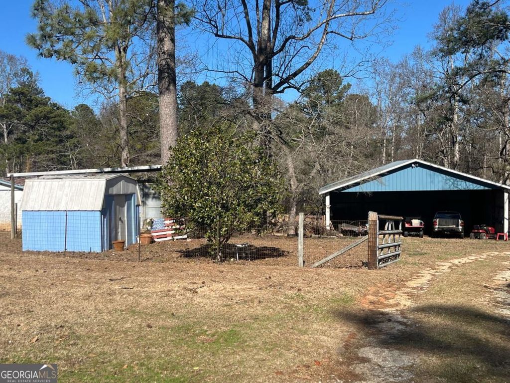 Photo of 9010 Clark Road, Fairburn, GA 30213 (MLS # 10692320)