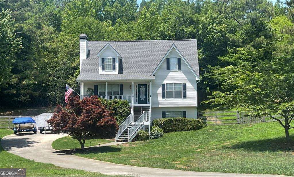 Beautiful Home in a Highly Sought-After School District This charming Cape Cod-style residence offers the perfect blend of comfort, functionality, and style. The open-concept floor plan features a chef's kitchen equipped with a gas stove and hood, granite countertops, and abundant cabinetry-ideal for both everyday living and entertaining. The main level showcases new luxury vinyl plank (LVP) flooring and includes a spacious primary suite with dual closets and an upgraded en-suite bathroom. Upstairs, you'll find two generously sized bedrooms, each with ample closet space, as well as convenient walk-in attic storage. The oversized two-car garage provides room for vehicles, a boat, or additional storage needs, all with freshly sealed floor. A bonus room with new LVP flooring on the lower level offers flexible space-perfect for a home office, gym, or playroom. Outdoors, enjoy a large fenced backyard complete with a fire pit, ideal for relaxing or entertaining. This move-in-ready home combines timeless design with modern updates in an exceptional location.