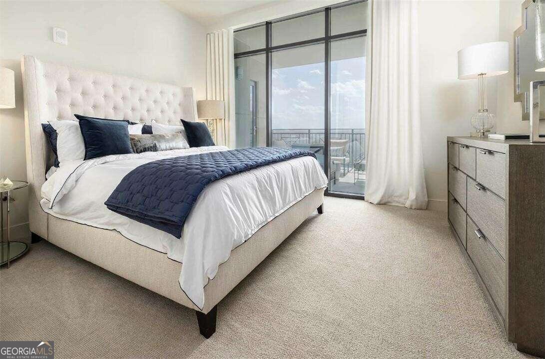 Saltwater pool with sunbathing ledge on spacious terrace level featuring exquisite skyline views. Outdoor amenity deck with cabanas, fire pit, fireplace, grilling stations, plentiful seating and lush landscaping. Spacious two-story lobby with fireplace. 24/7 concierge staff available to assist residents, provide area information, receiving packages and dry-cleaning. Climate controlled personal storage. Large kitchen islands with waterfall quartz. Floor to ceiling windows. Beverage center with wine shelving.