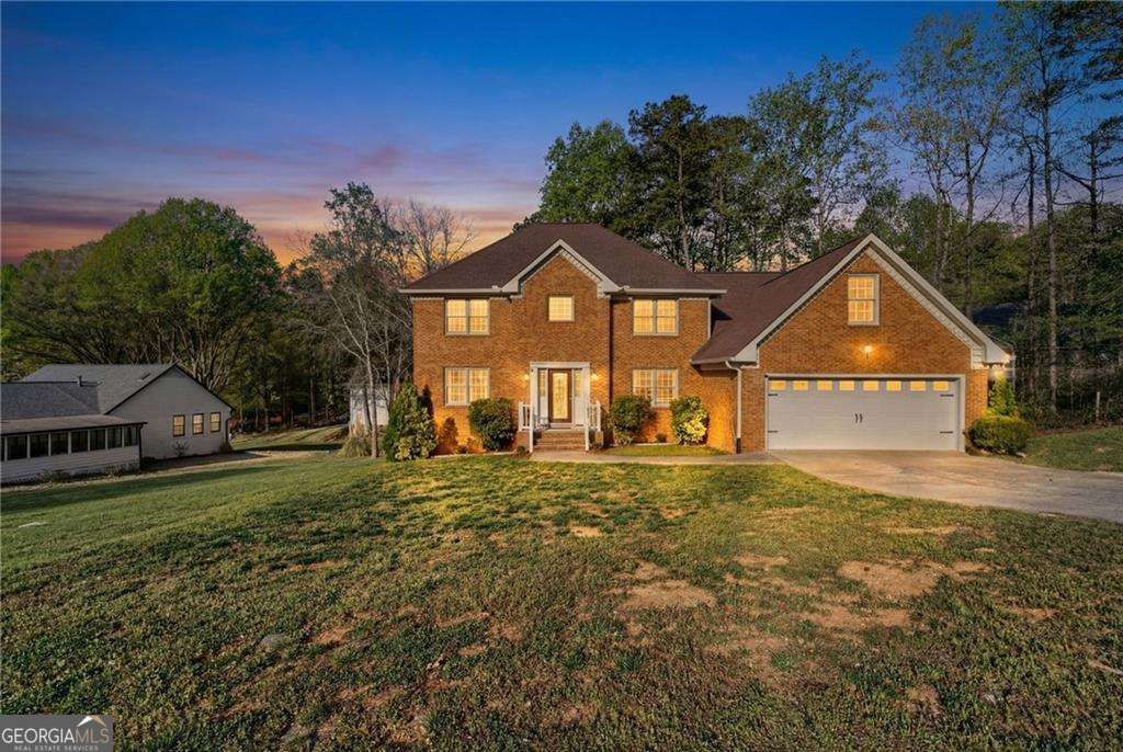 Photo of 835 Lockriver Way, Lawrenceville, GA 30044 (MLS # 10727359)