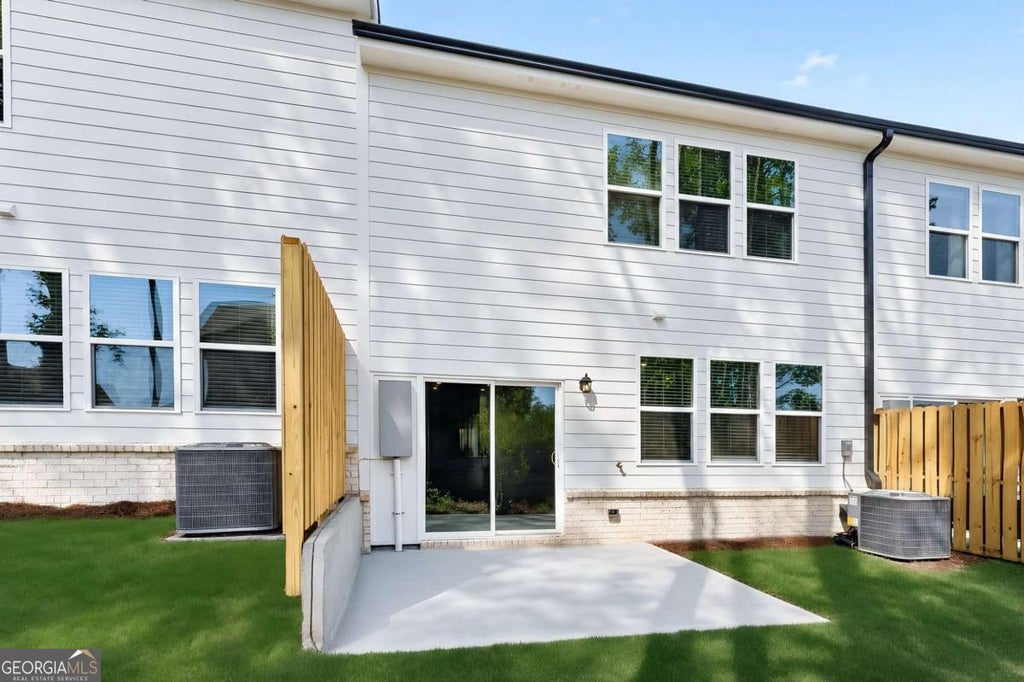 Photo of 893 Rainwater Trace, Lawrenceville, GA 30044 (MLS # 10777819)